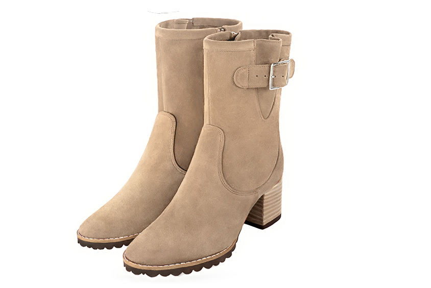 Tan beige women's ankle boots with buckles on the sides. Round toe. Medium block heels. Front view - Florence KOOIJMAN